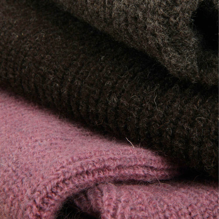 Close-up of dark brown and pink textured fabric