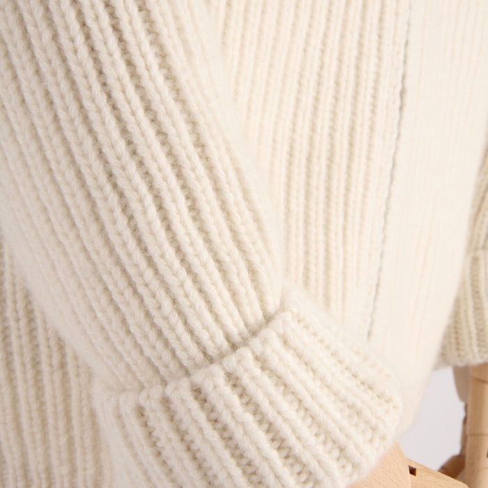 Close-up of white rib knitted sleeve
