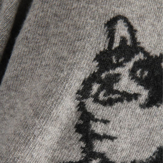 Close-up of a textured gray fabric with a patterned design.