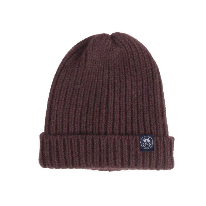 Brown knit beanie with a logo tag on a white background