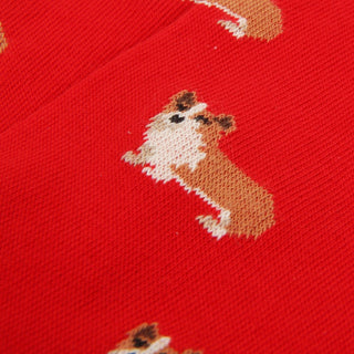 Red fabric with a corgi dog pattern