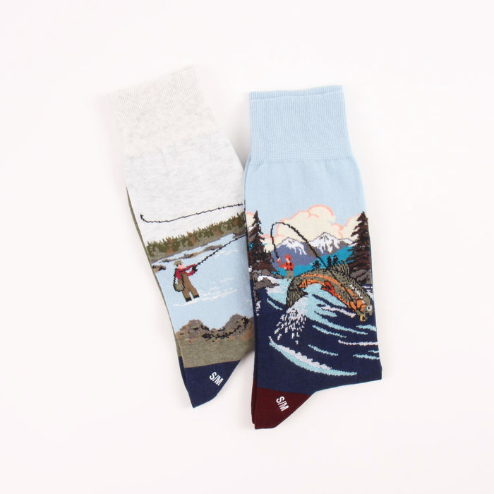 Two socks with fishing-themed designs on a white background