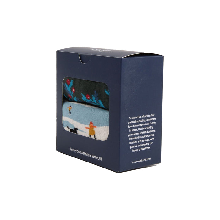 Box of socks with a design of people ice skating, displayed against a white background.