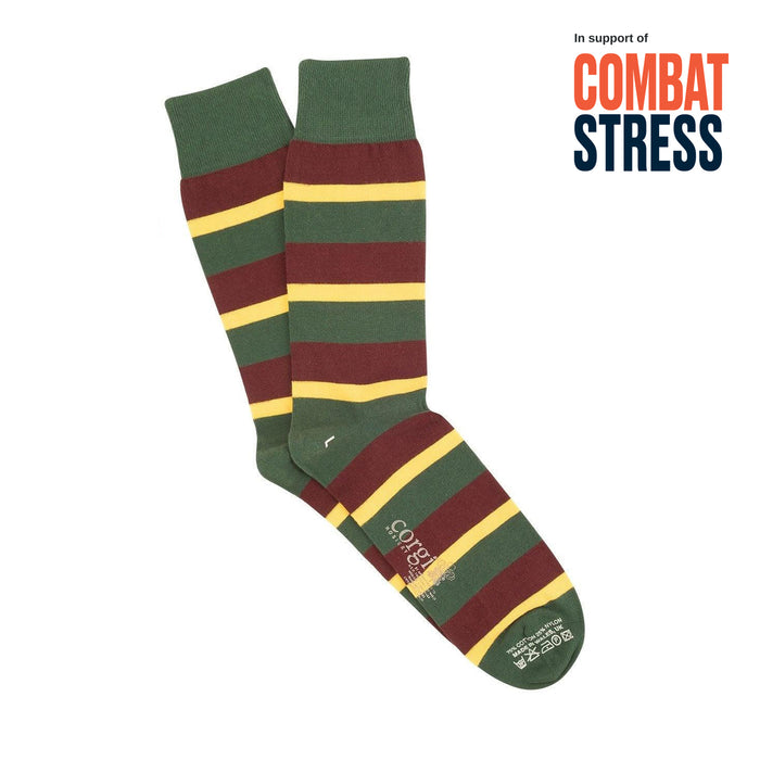 Striped socks with green, red, and yellow colors on a white background, featuring 'Combat Stress' text.