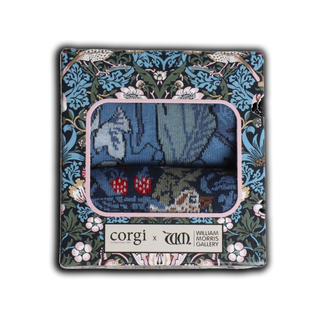 A box of Men's William Morris socks with a floral and animal pattern, including pairs with bird and berry motifs and swirling foliage designs.