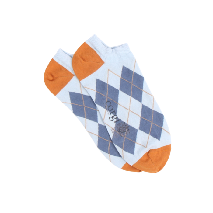 Pair of trainer socks with orange and blue argyle pattern on a white background