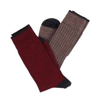Two pairs of ribbed socks in red and brown on a white background