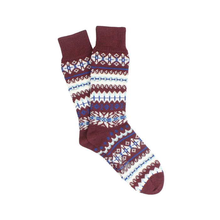 Knitted sock with a pattern on a white background