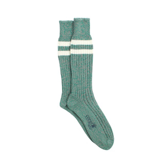 Green sock with white stripes on a white background