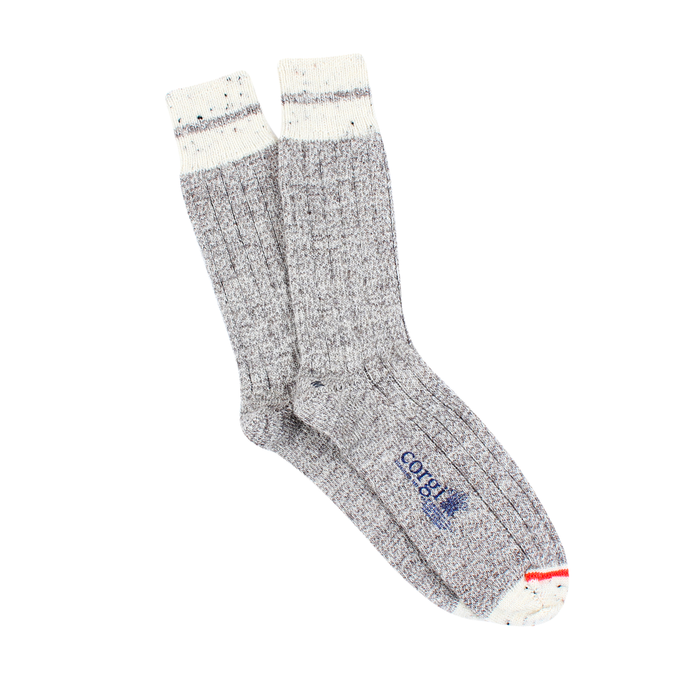 A pair of men's striped cuff British wool socks in gray with a neon flash on the toe area, designed for comfort and sustainability.
