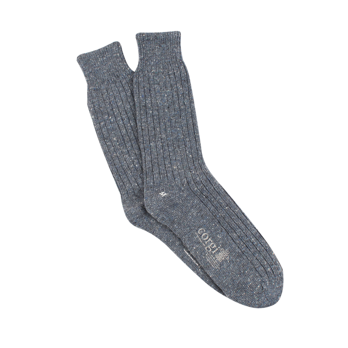Pair of denim socks on a white background