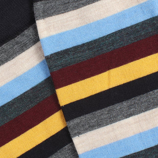 Close-up of striped fabric with blue, yellow, red, and gray colors.