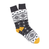 A pair of men's socks with a vintage fair isle pattern, featuring a geometric design in grey and yellow colours.