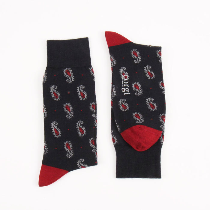 Navy socks with red accents and paisley pattern on a white background