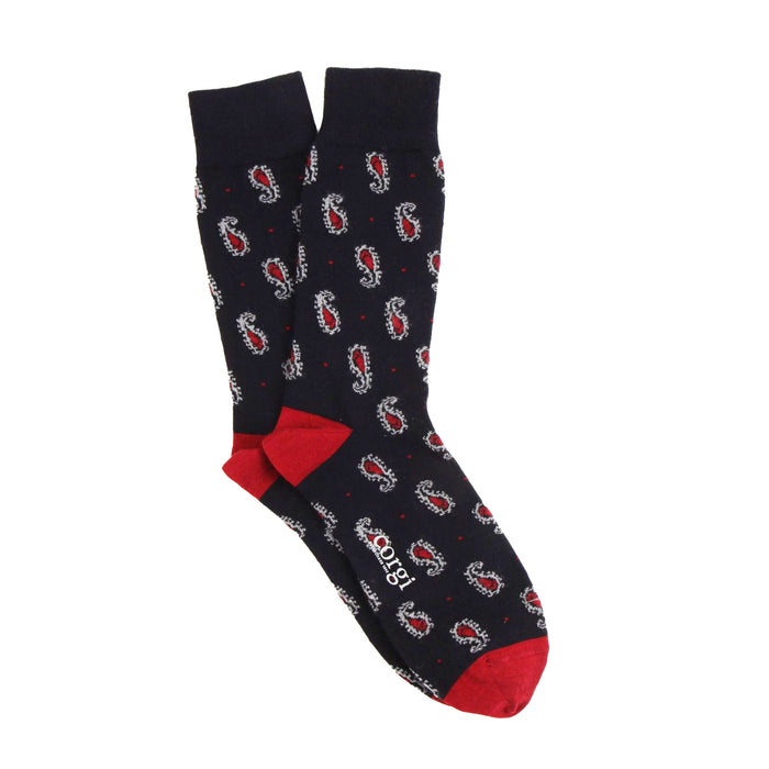 Navy sock with red accents and paisley pattern on a white background