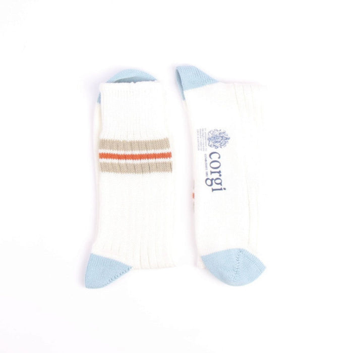 Pair of socks with striped pattern and 'corgi' branding on a white background