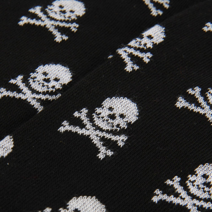 Black fabric with white skull and crossbones pattern