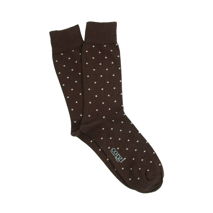 Brown socks with white polka dots on a white background