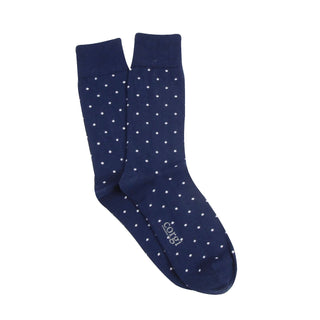 Navy blue socks with white polka dots on a white background