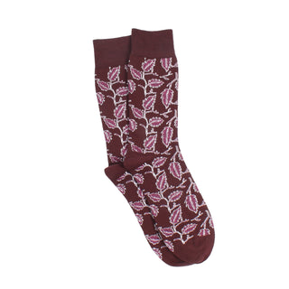 Maroon sock with pink leaf pattern on a white background