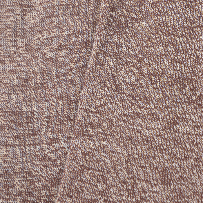 Close-up of a textured brown fabric pattern