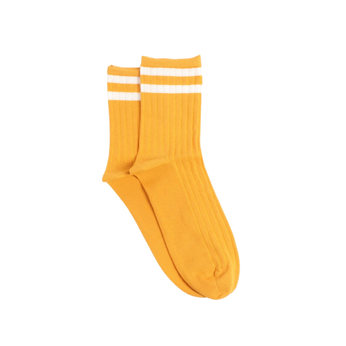 Yellow socks with two fine white stripes at the top section of the sock photographed on a white background