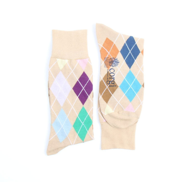 Pair of argyle pattern socks with visible Corgi brand logo on a white background