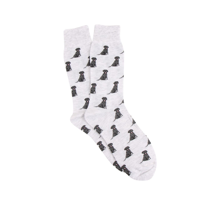 light grey socks with an all over intarsia black Labrador retriever pattern photographed on a white background