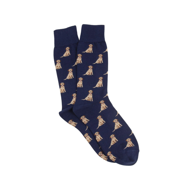 Navy blue socks with an all over golden brown Labrador dog pattern photographed on a white background