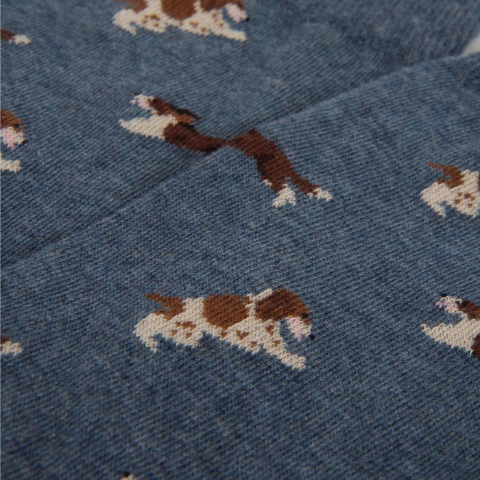 Blue fabric with brown and white dog pattern