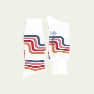 White sock with colorful wavy pattern on a white background