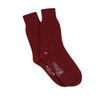Pair of maroon socks with a visible brand logo on a white background