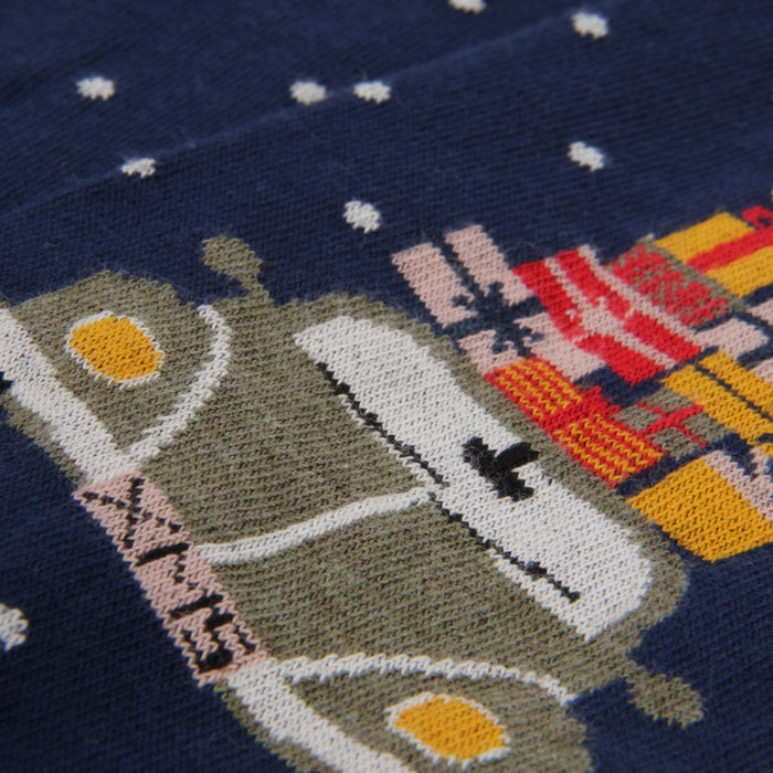 Sock with vintage car design featuring snow on a dark blue background