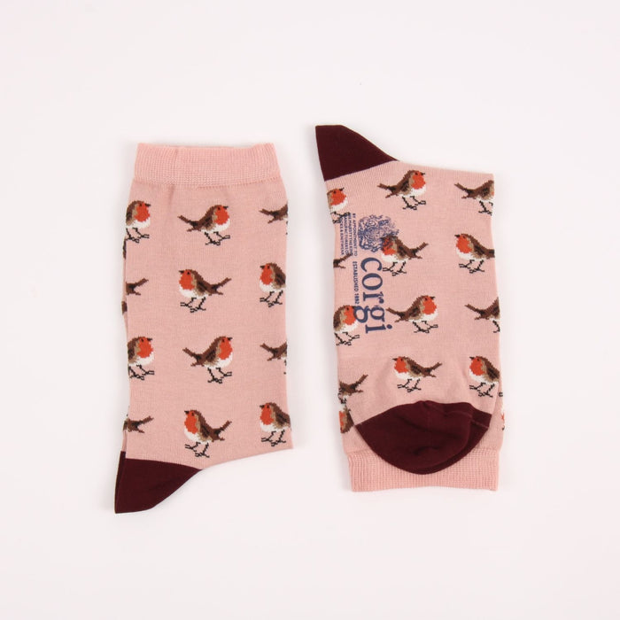Pair of socks with robin design on a pink background