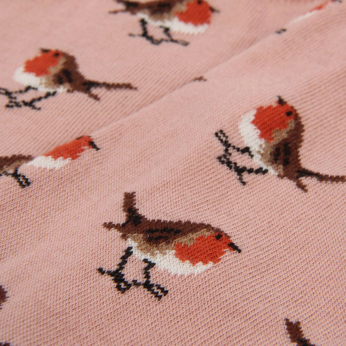 Pattern of birds on a pink background