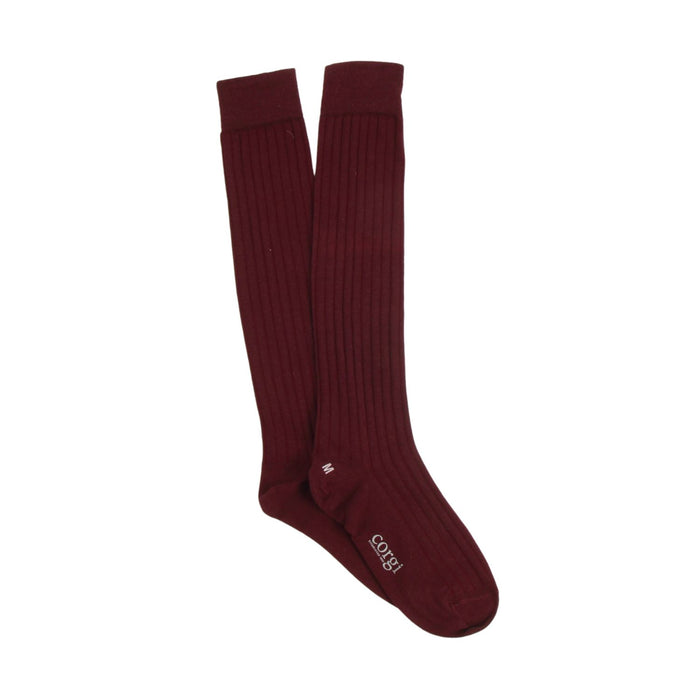 Pair of maroon knee-high socks on a white background
