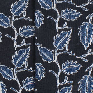 Close-up of navy fabric with white floral pattern