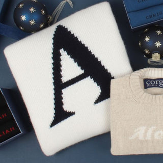 sweater on a Christmas gifting flat lay display