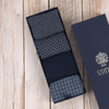 Men's 4-Pair Navy Dress Socks in a gift box.