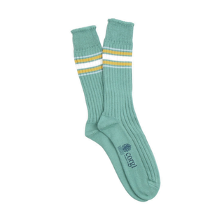 Green sock with white and yellow stripes on a white background