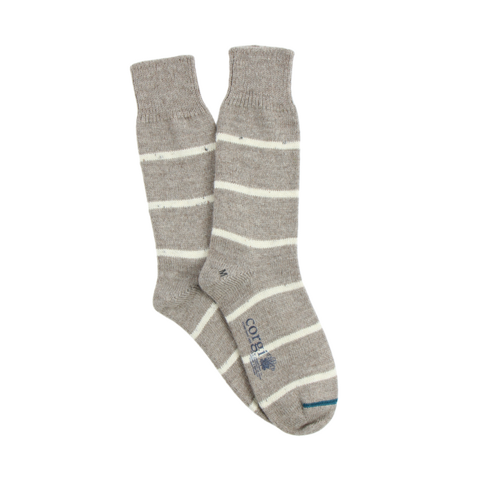 A pair of beige and white striped men's British wool socks.