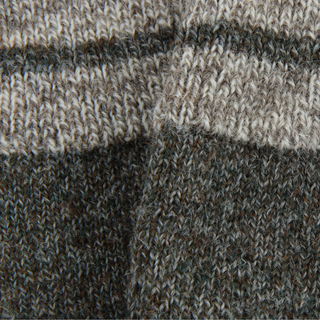A pair of men's striped cuff British wool socks in gray with a subtle neon flash on the toe, designed for comfort and sustainability close up.
