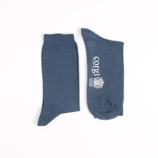 Blue socks with 'Corgi' branding on a white background