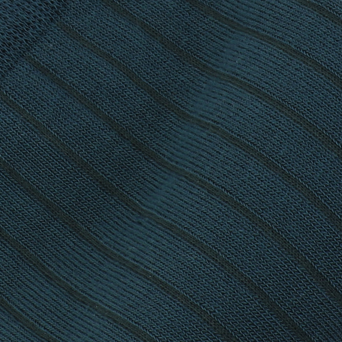 Close-up of textured dark blue fabric with diagonal lines