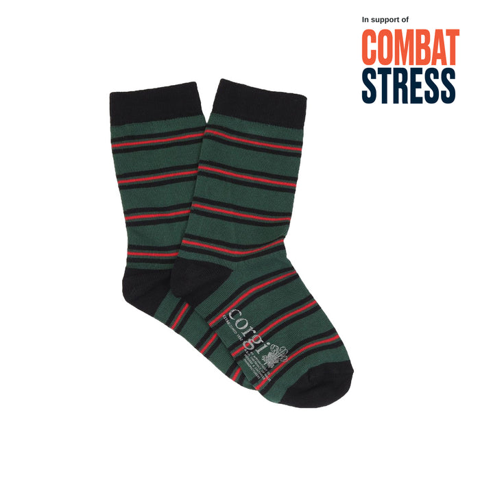 Green and black striped socks with red accents on a white background, featuring 'Combat Stress' text.
