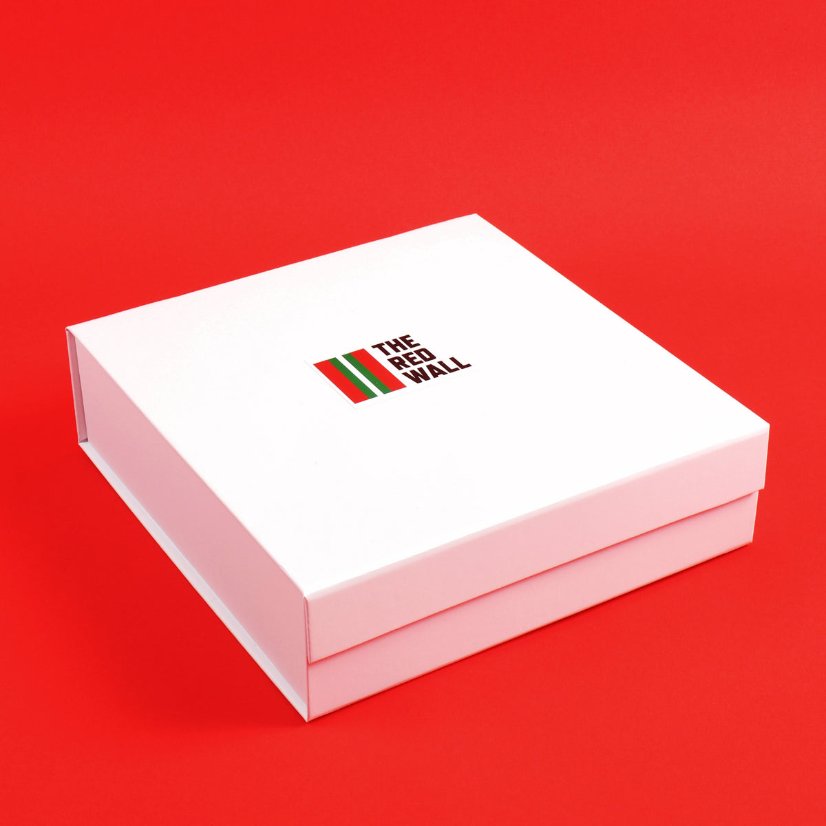 The Red Wall box on a red background.