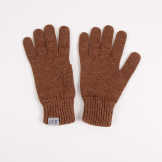Pair of brown gloves with a visible brand label on a white background