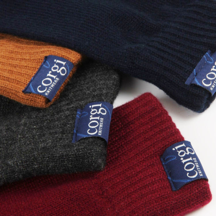 Four knitted socks in black, red, gray, and brown with 'corgi' labels on a white background.