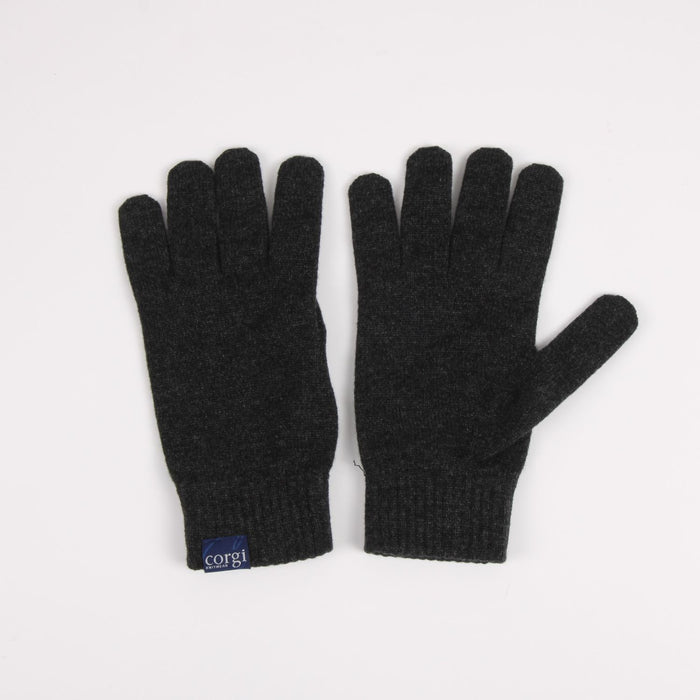 Pair of black gloves with a visible brand logo on a light gray background