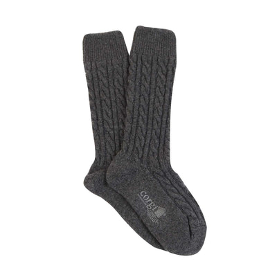 A pair of grey cashmere socks with a cable knit pattern, displayed against a white background.